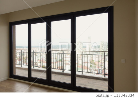 Modern building with tinted windows. Urban architecture 113348334