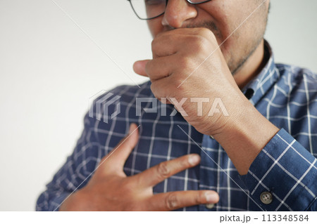 Sick man got flu allergy sneezing and blowing nose 113348584