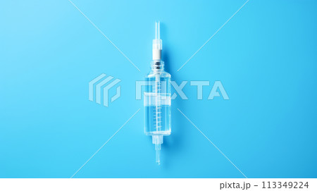 A syringe with a vaccine against diseases on a blue background. 113349224