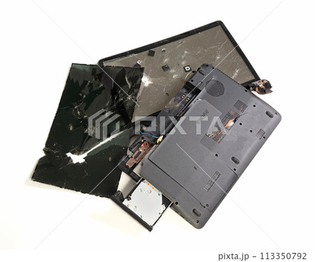Old broken laptop isolated on white backgroundの写真素材 [113350792] - PIXTA