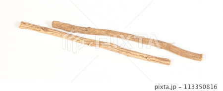 Licorice roots isolated on white background Licorice roots isolated on white background 113350816