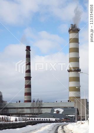 The main provides the city with hot water. Selective focus. The pipes of the central heating system 113354808