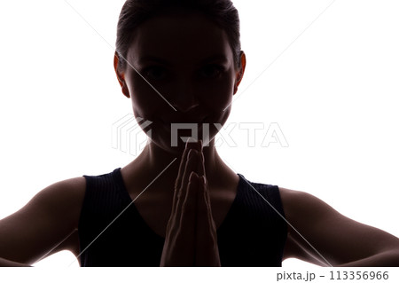 Young woman looking with hope and request - front view Young woman looking with hope and request - front view 113356966