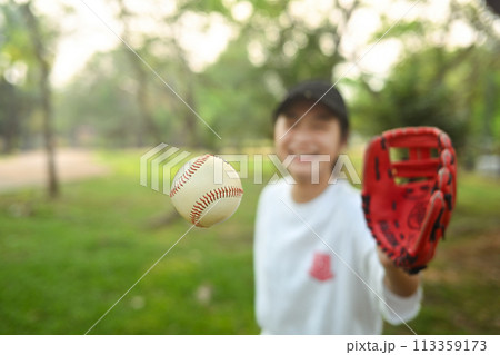 School girl in baseball glove catching a ball. Sports and youth lifestyle concept 113359173