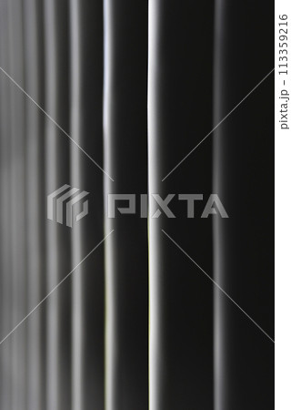 【縦写真】黒いカーテンの背景素材 【縦写真】黒いカーテンの背景素材 113359216