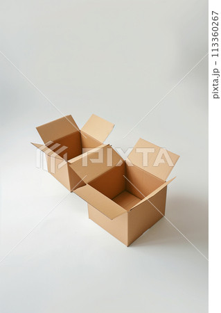 Two cardboard boxes are stacked on top of each other 113360267