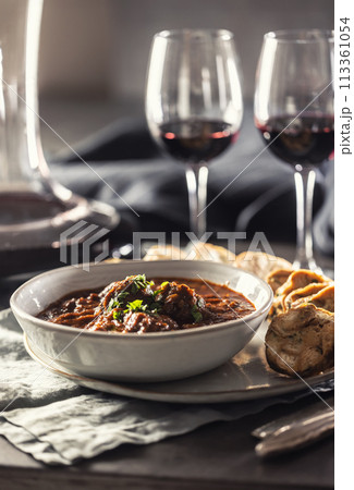 Traditional Viennese, venison or Hungarian goulash with Karlovy Vary dumplings and red wine 113361054