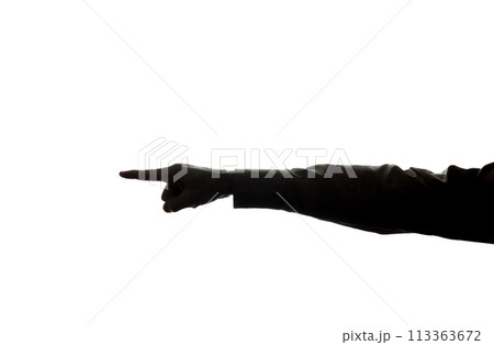 The man's hand points the index finger - silhouette 113363672