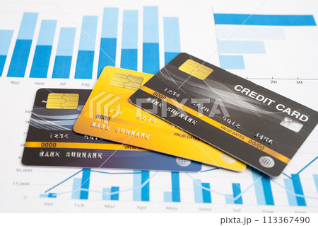 Credit card model on chart and graph spreadsheet paper. 113367490