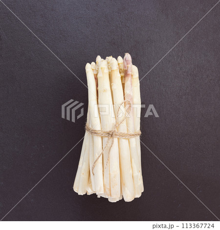 Tied bunch of white asparagus ready for culinary use Tied bunch of white asparagus ready for culinary use 113367724