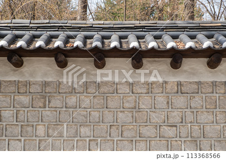 Deoksugung Stonewall Walkway in winter. It is the pedestrian footpath that runs next to Deoksugung Palace in Seoul, South Korea Deoksugung Stonewall Walkway in winter. It is the pedestrian footpath that runs next to Deoksugung Palace in Seoul, South Korea 113368566