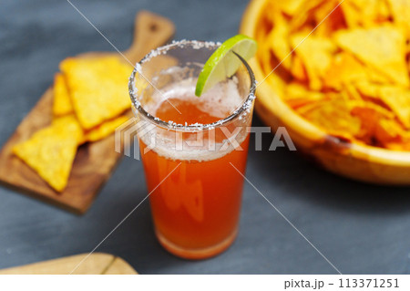 Michelada, Mexican alcoholic cocktail with beer, lime juice, tomato juice Michelada, Mexican alcoholic cocktail with beer, lime juice, tomato juice 113371251