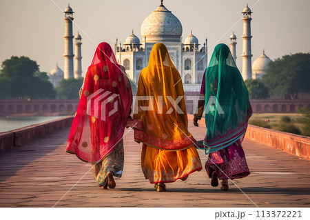 Indian women in colorful sari and temple 113372221