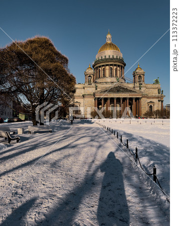 Snow-covered Park in front of St. Isaac's Cathedral in St. Petersburg - Russia in the spring sun 113372223