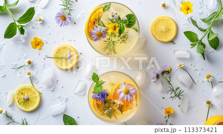 Delicious Lemonade with Fresh Mint and Chamomile Flowers for a Refreshing Summer Beverage Delicious Lemonade with Fresh Mint and Chamomile Flowers for a Refreshing Summer Beverage 113373421