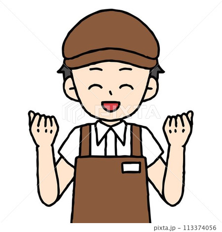 男性のカフェ店員がガッツポーズをしている 113374056