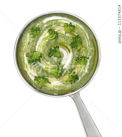 Broccoli cream soup in ladle isolated on white background with clipping path, top view, full depth of field 113374814
