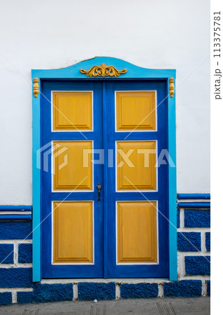 Beautiful facade of the houses at the historical downtown of the heritage town of Salamina located at the Caldas department in Colombia. 113375781