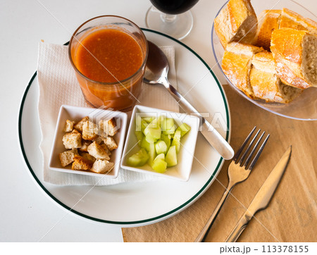 Gazpacho in glass spanish tomato based cold vegetable soup served with cucumbers Gazpacho in glass spanish tomato based cold vegetable soup served with cucumbers 113378155
