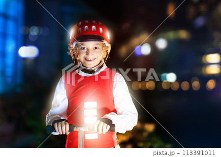 Safety on dark street. Kids reflective vest. Safety on dark street. Kids reflective vest. 113391011