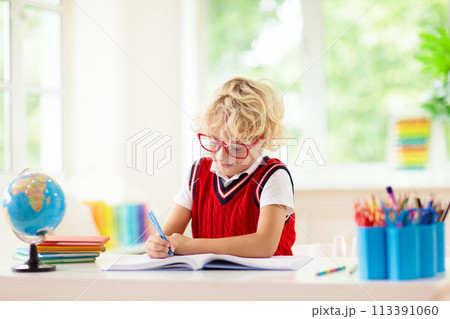 Kids doing homework. Children go back to school. 113391060