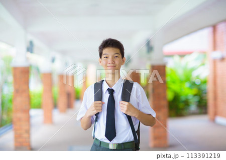 Kids back to school. Asian student with backpack. 113391219