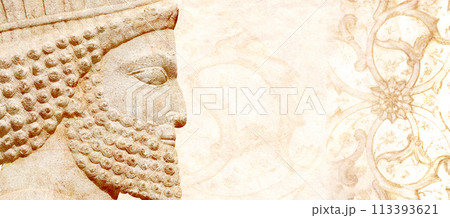 Grunge backdrop with bas-relief of face of assyrian warrior, Persepolis, Iran. Horizontal background with embossed image persian bearded man. Mock up template. Copy space for text 113393621