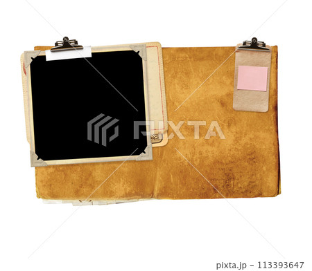 Old book cover, retro photo frame with paper tag attached with a vintage clip. Nostalgic scrapbooking style. Paper labels clipped to a photo. Mock up template. Copy space for text. Isolated on white 113393647