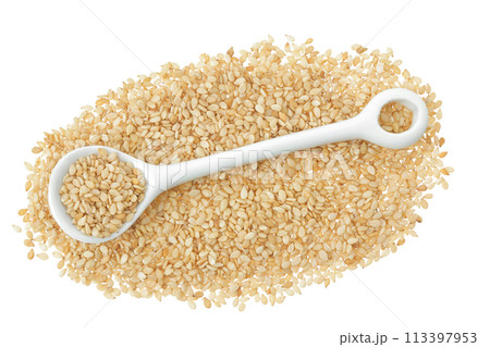 Sesame seeds in ceramic spoon isolated on white background. Top view. Flat lay 113397953