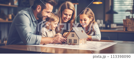 Family planning to buy a new house and choosing project according blueprint. 113398090