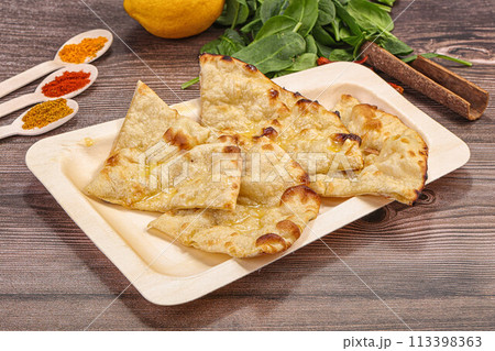 Indian tandoori bread - Butter naan 113398363