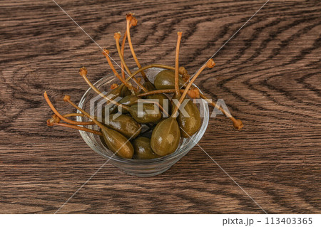 Caper berries in the bowl 113403365