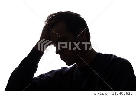 A young man with grief tearing at her hair A young man with grief tearing at her hair 113405620