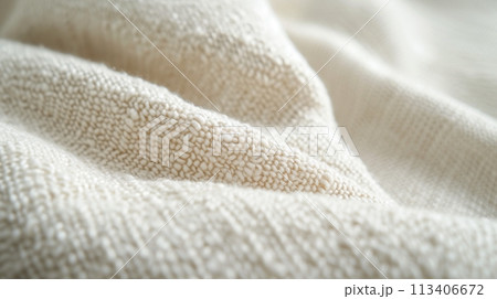 Close-up of a textured woven natural fabric Close-up of a textured woven natural fabric 113406672