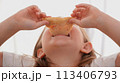 A girl eats pizza, Baby food, Fast food. High quality photo 113406793