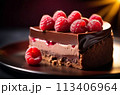 A chocolate lover's dream, this raspberry cheesecake features a decadent syrup and a visually stunning presentation of fresh berries, making it an exquisite treat for the eyes and the taste buds 113406964