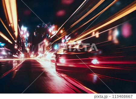 A dynamic image of a street at night showing light trails. 113408667