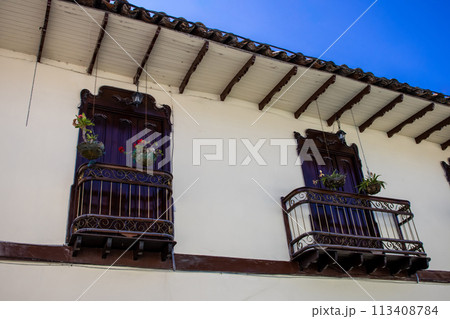 Beautiful facade of the houses at the historical downtown of the heritage town of Salamina located at the Caldas department in Colombia. 113408784