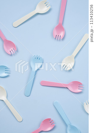 Set of kid forks lying on blue background. Set of kid forks lying on blue background. 113410256