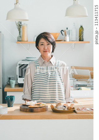 a forty-something woman a forty-something woman 113411715