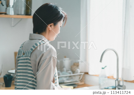 a forty-something woman a forty-something woman 113411724