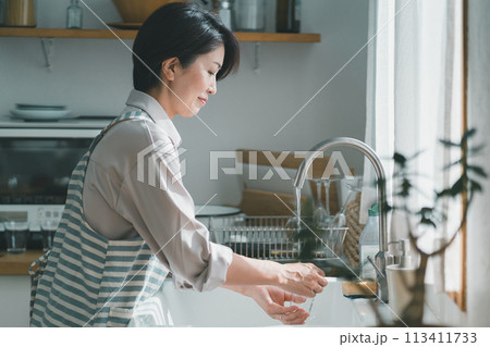 a forty-something woman a forty-something woman 113411733