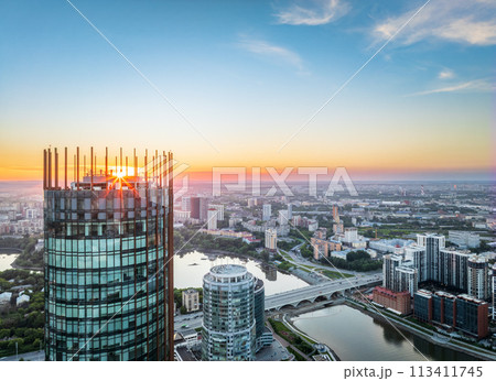 Yekaterinburg city and pond aerial panoramic view at summer sunset. 113411745