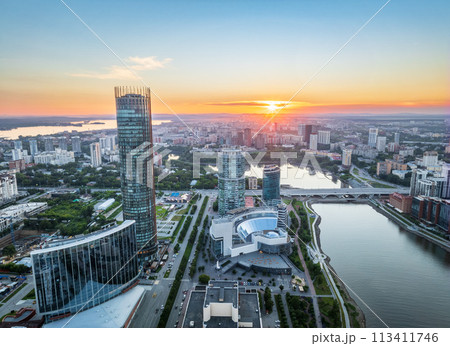 Yekaterinburg city and pond aerial panoramic view at summer sunset. 113411746