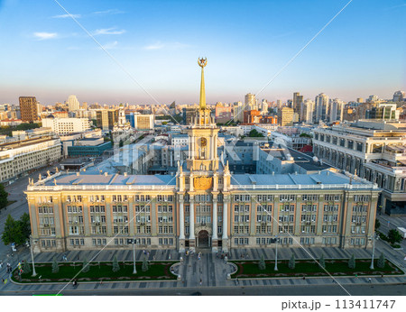 Yekaterinburg City Administration or City Hall and Central square at summer evening. Evening city in the summer sunset, Aerial View. Yekaterinburg City Administration or City Hall and Central square at summer evening. Evening city in the summer sunset, Aerial View. 113411747