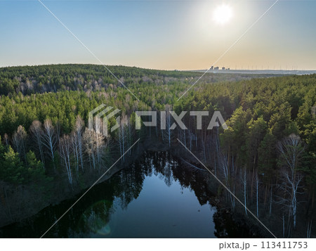 Spring or autumn lake in forest. Aerial view of lake in spring or autumn Spring or autumn lake in forest. Aerial view of lake in spring or autumn 113411753
