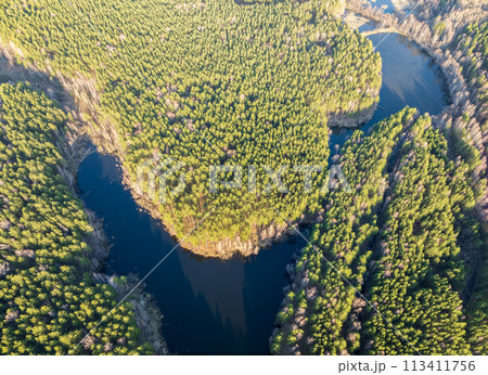 Spring or autumn lake in forest. Aerial view of lake in spring or autumn Spring or autumn lake in forest. Aerial view of lake in spring or autumn 113411756
