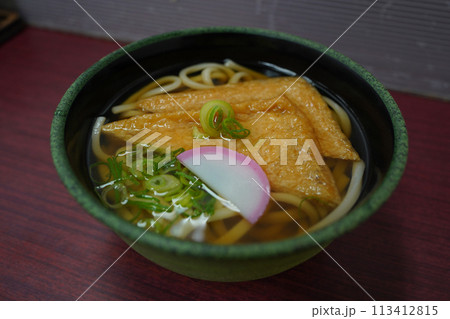 Japanese-style udon with large pieces of tofu 113412815