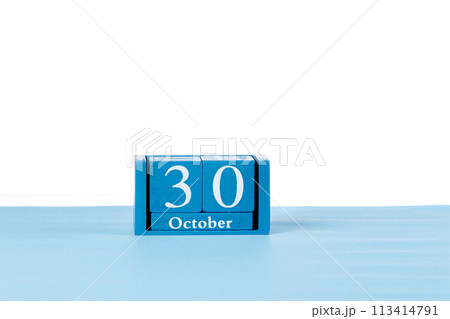 Wooden calendar October 30 on a white background 113414791