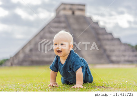 Baby traveler, tourists observing the old pyramid and temple of the castle of the Mayan architecture known as Chichen Itza these are the ruins of this ancient pre-columbian civilization and part of Baby traveler, tourists observing the old pyramid and temple of the castle of the Mayan architecture known as Chichen Itza these are the ruins of this ancient pre-columbian civilization and part of 113415722